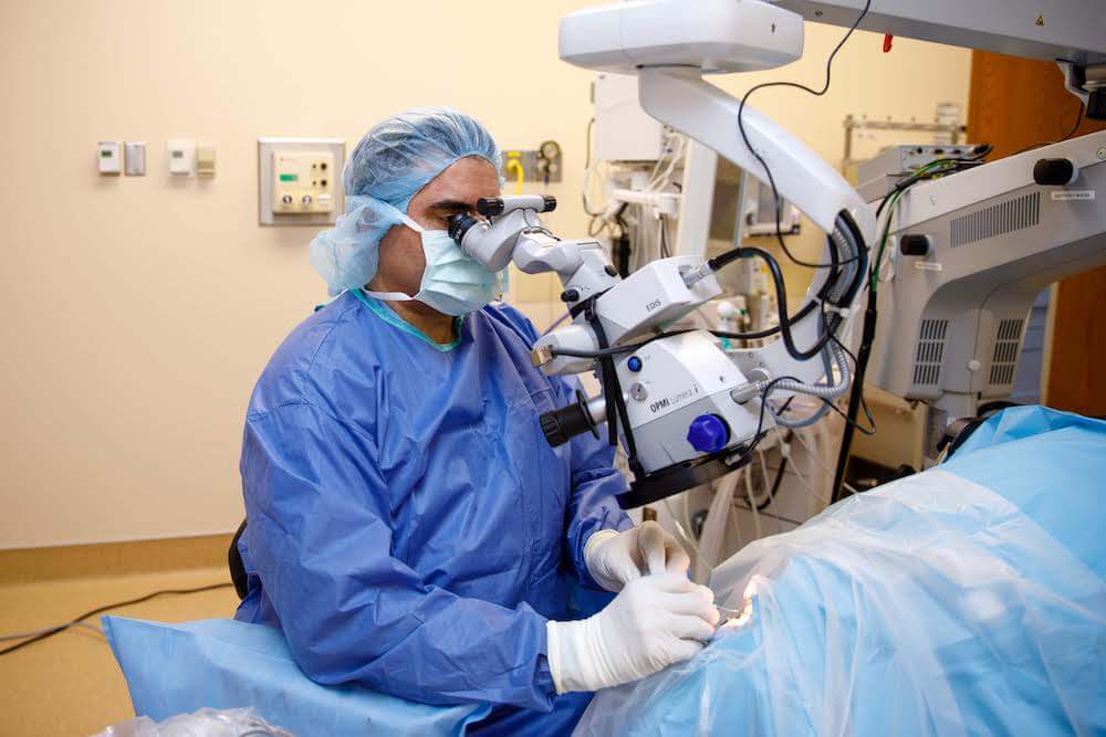 Dr. Husain performing surgery